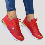 Women stylish metallic accent trainers