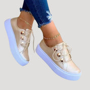 Women’s platform lace-up sneakers with gold eyelets