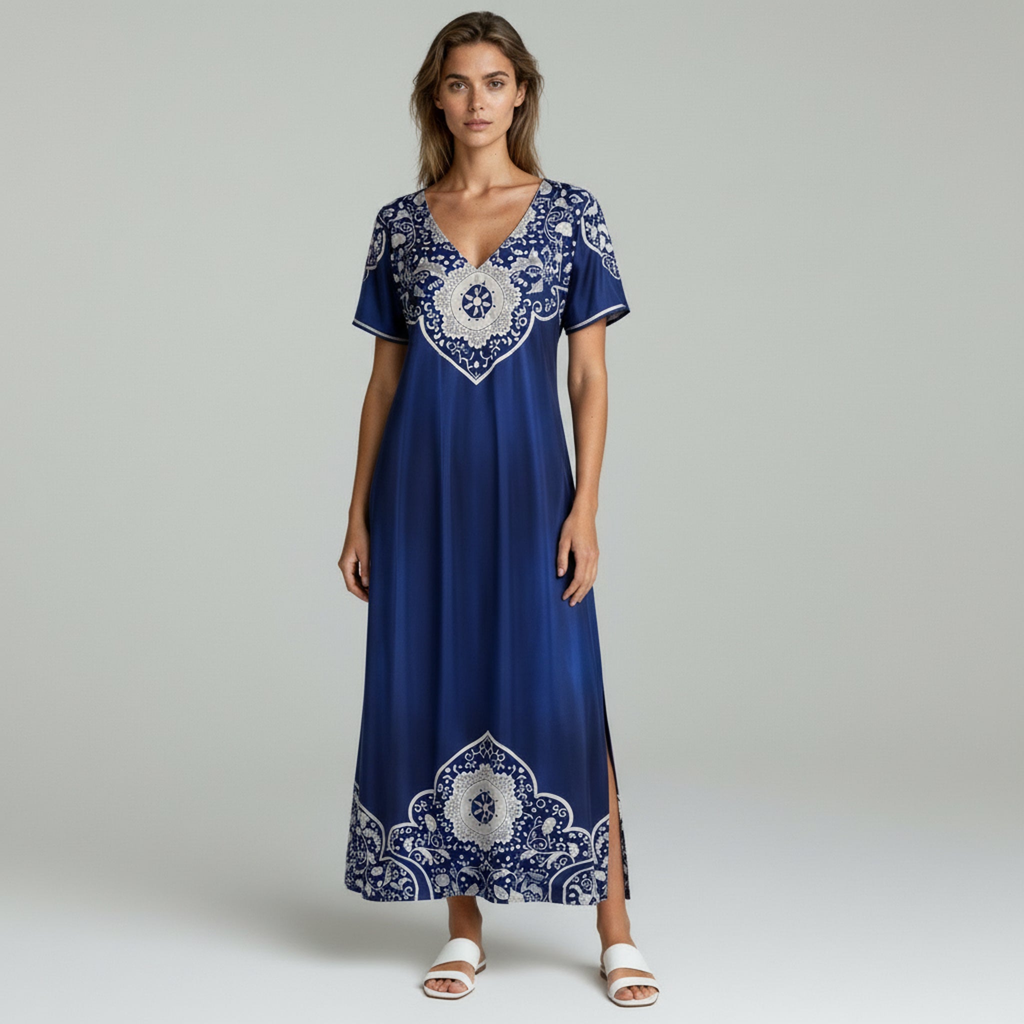 lady in blue summer dress on a plain background