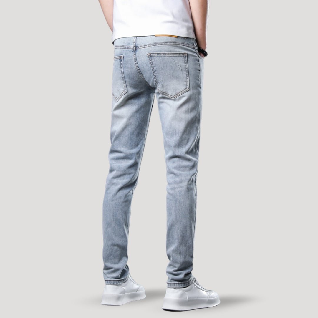 Distressed Slim Fit Jeans - Montford & Co