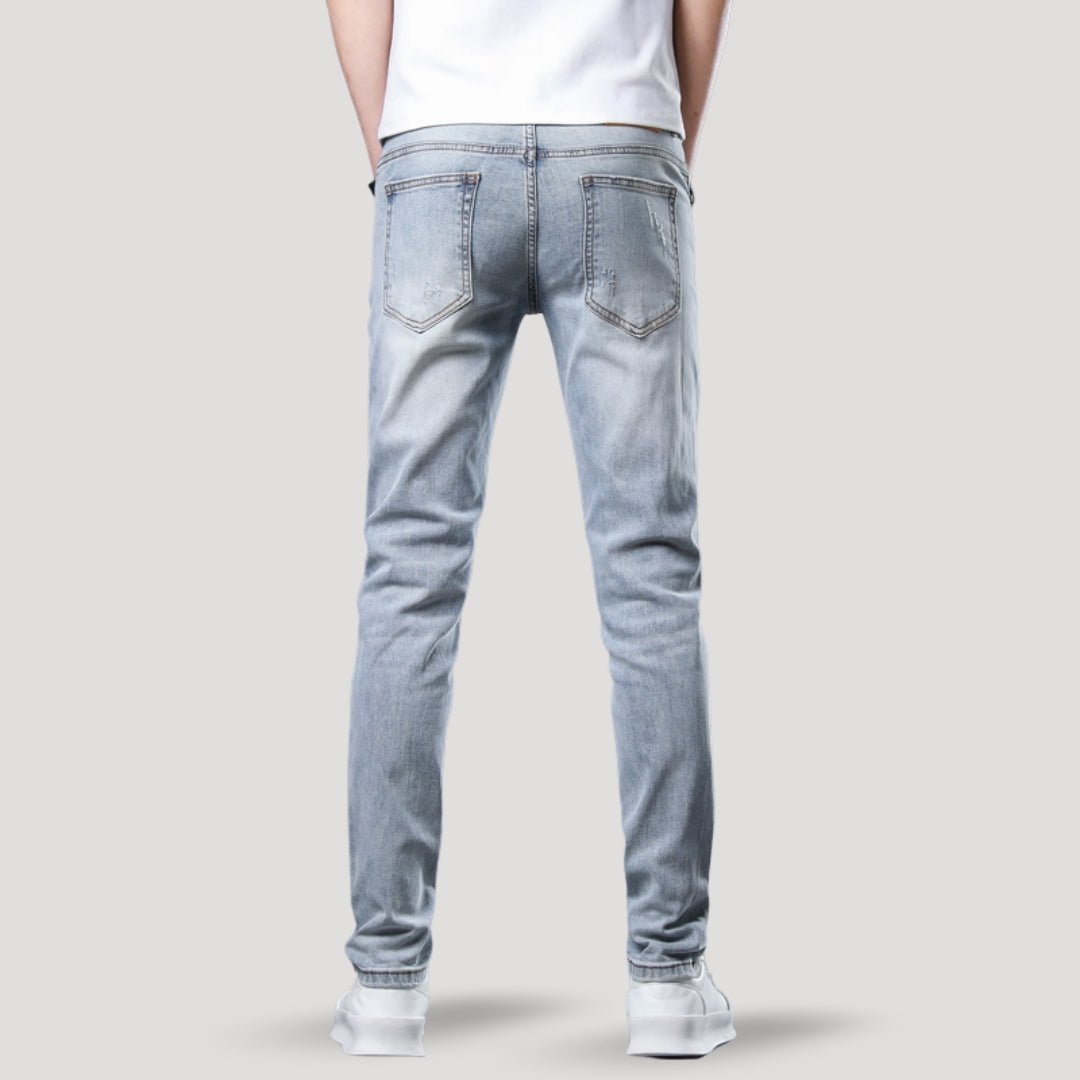 Distressed Slim Fit Jeans - Montford & Co